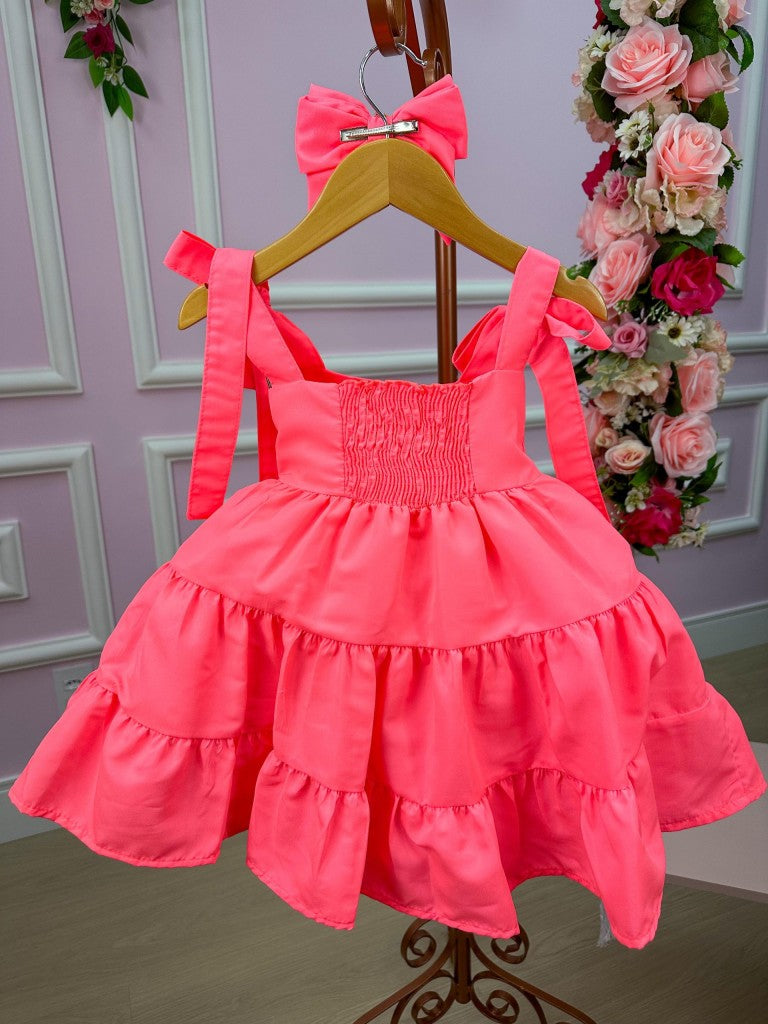 Vestido Infantil Rosa Neon com Laço e Gola Redonda
