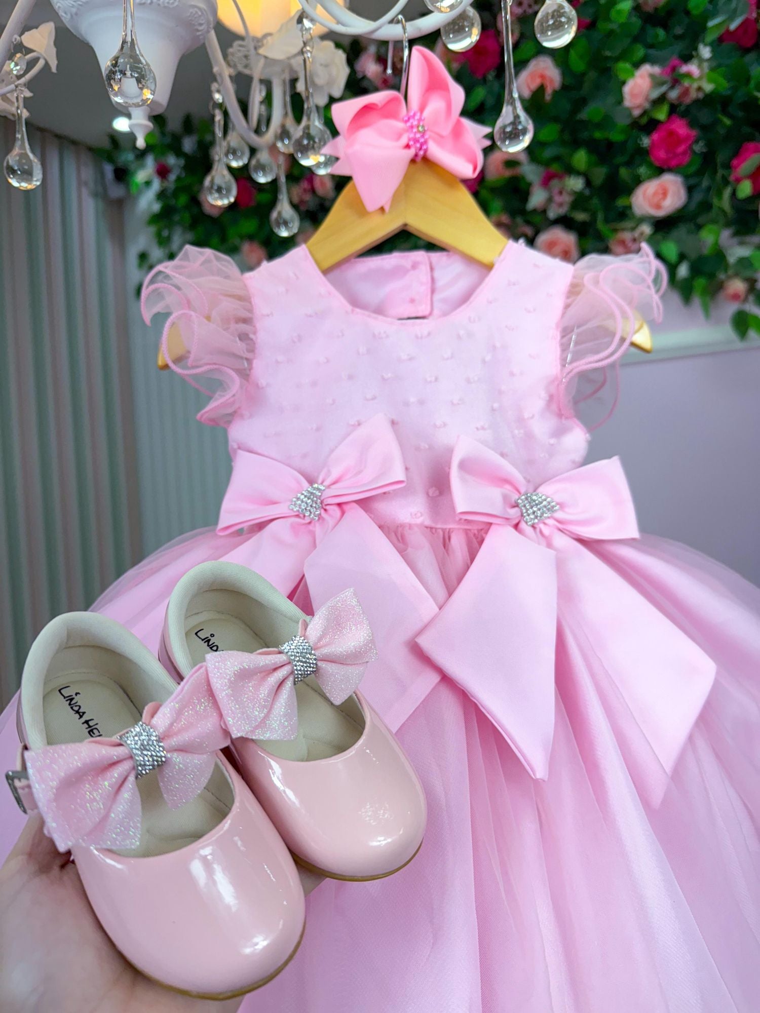 Vestido Rosa Bebê em Tecido Tafeta com Laço e Gola Redonda